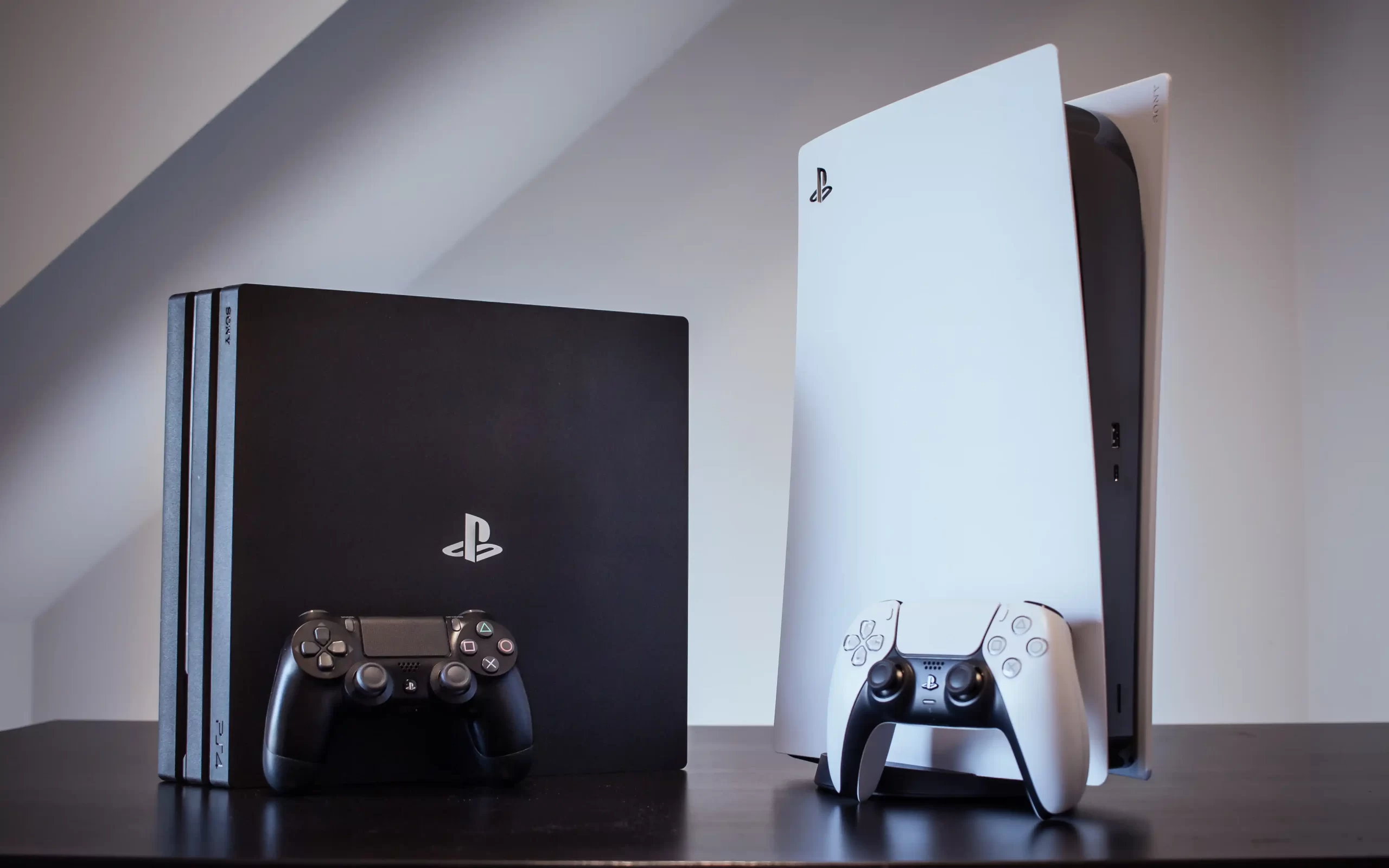 Gaming console repair services showing professional technician working on a PlayStation or Xbox